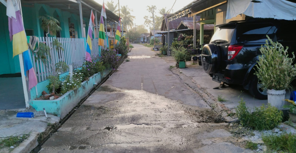 Persoalan limbah Rumah Tangga Yang Dialirkan Ke Jalan Umum, Lurah Jayamukti Dinilai Gagal Dalam Mediasi Warga di RT 022